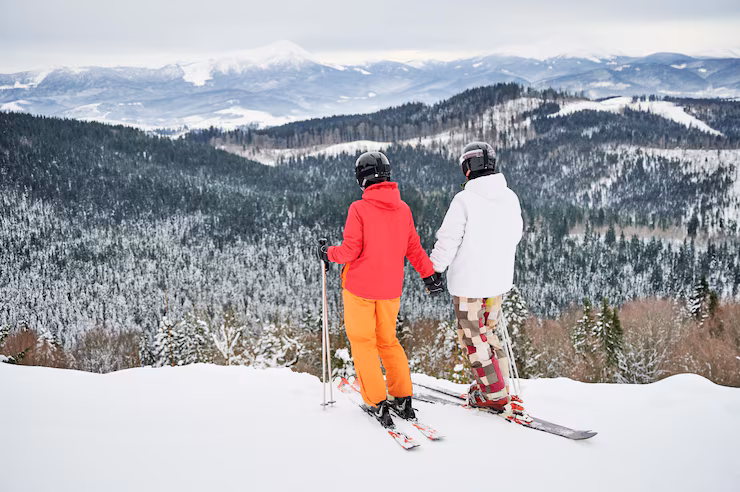 Professional skier carving through fresh powder snow